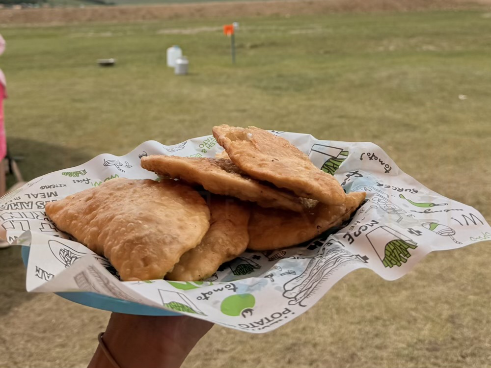 Myagmarsuren khuushuur camp: Our signature homemade khuushuur. We make the dough from scratch and fry the meat pastries fresh to order. (Food, Khuushuur, Traditional Meal)