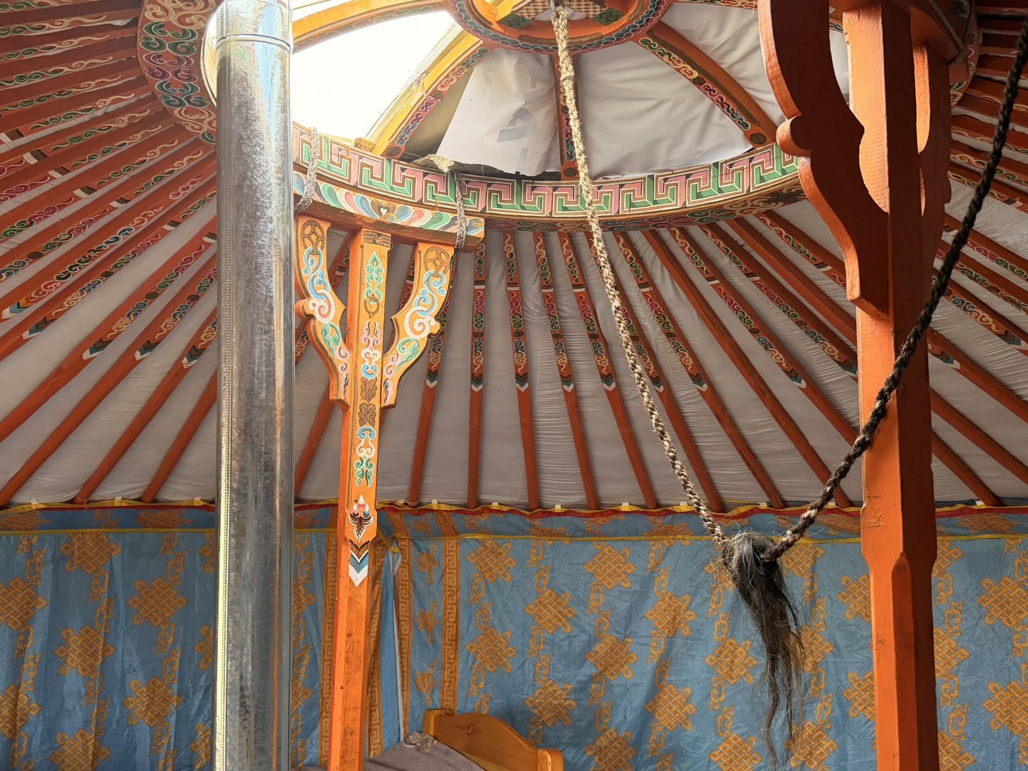 Myagmarsuren Shankh Monastery camp: The toono at the top of the ger is hand-painted in the traditional style, a detail found in most well-kept family gers. (Painted toono)