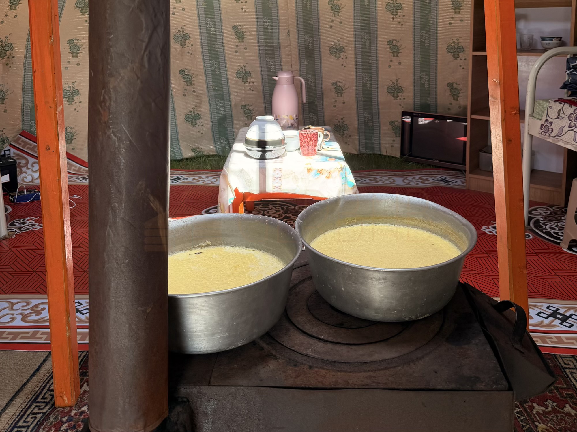 Batzaya camp: Resting the fresh Urum (clotted cream) to make it more thick. This process gives us the high-energy dairy we need for a long day outside. (Food Preparation, Urum, Dairy Processing)