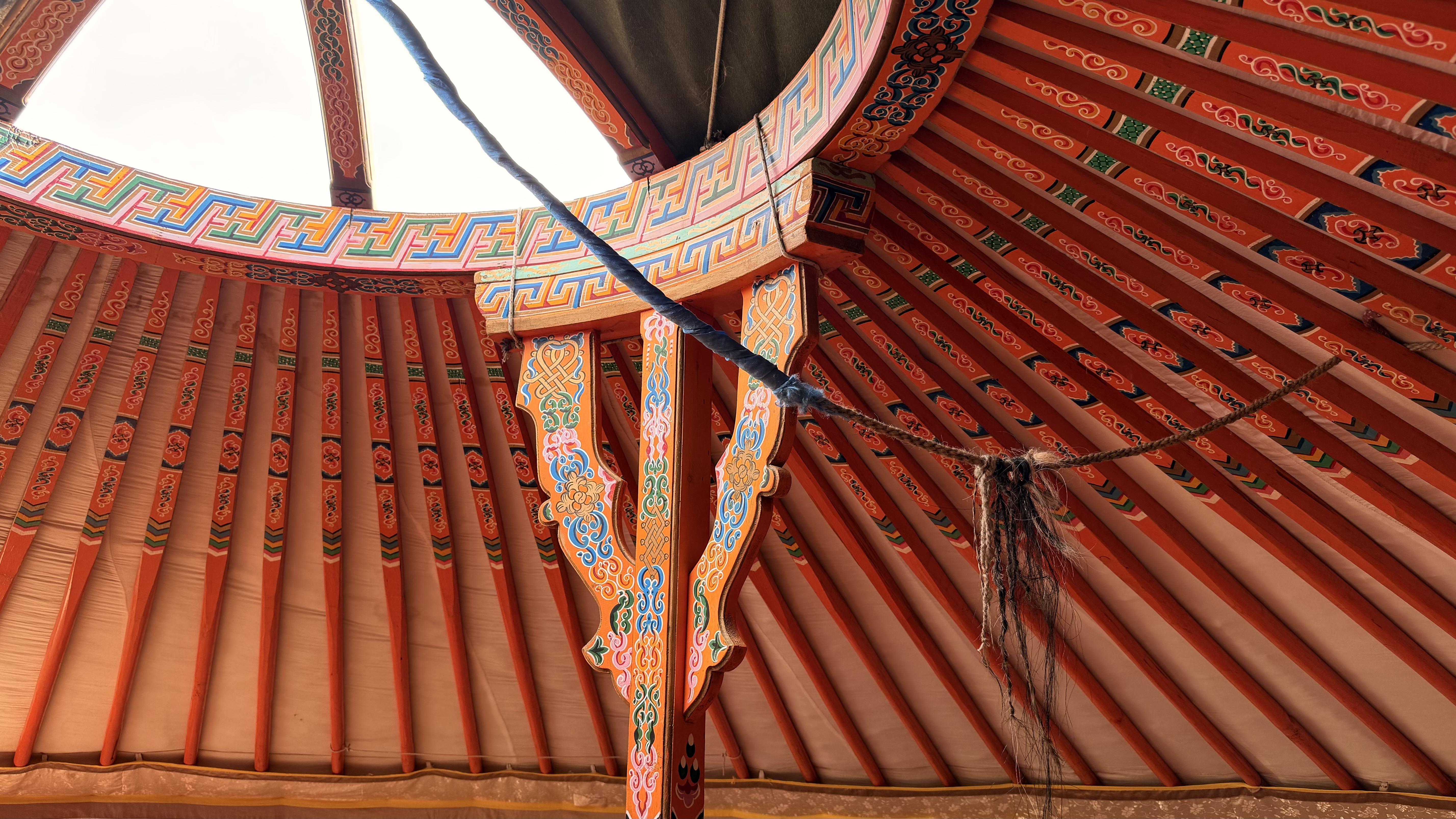 Tsedenlham Orkhon waterfall camp: The toono is hand-painted in the traditional pattern, letting light stream into the ger through the center. (Painted toono)