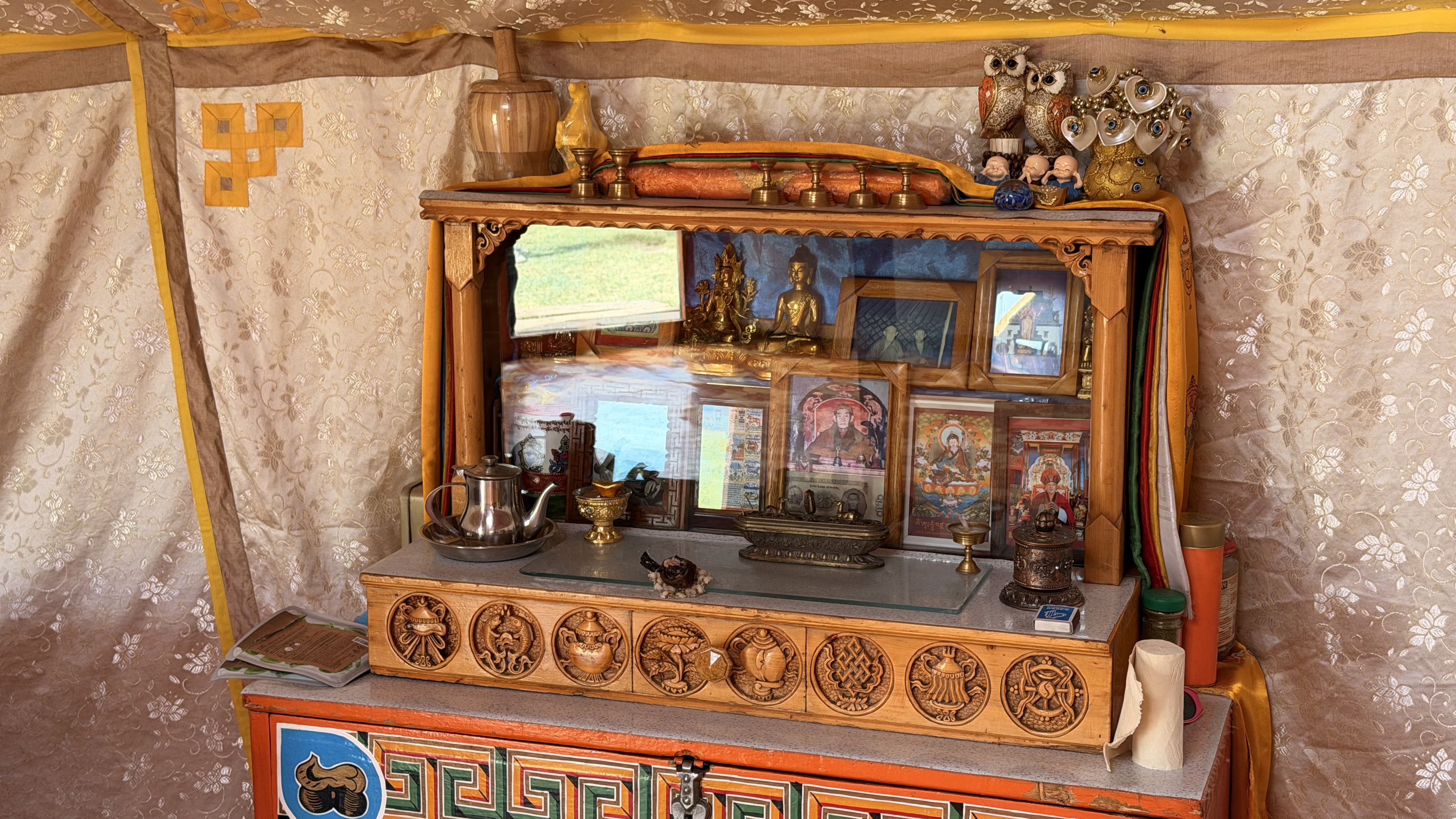 Tsedenlham Orkhon waterfall camp: A small Buddha altar sits at the back of the ger, a common fixture in Mongolian family homes. (Buddha corner)